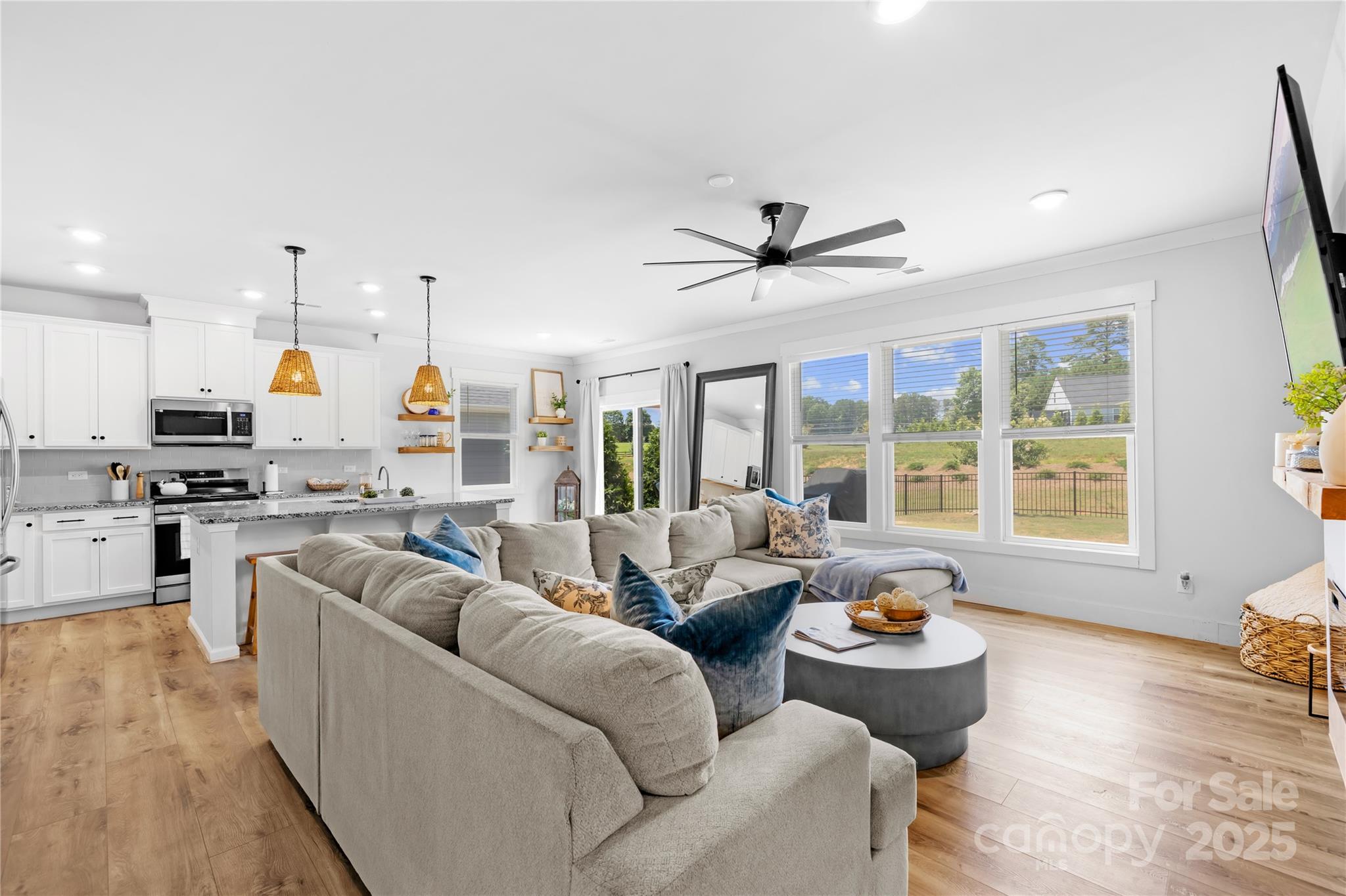 3610 Whitney Way, Unit 2 Terrell, NC 28682 - Photo 7 of 16 a living room with furniture kitchen and a large window