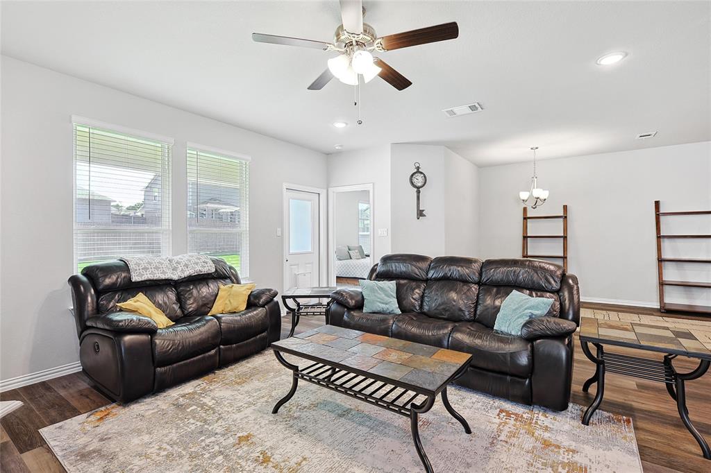 808 Feather Edge Drive Springtown, TX 76082 - Photo 18 of 40 a living room with furniture and a large window