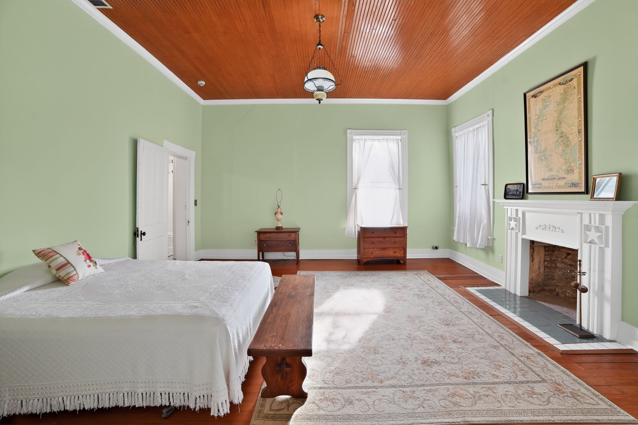400 South Main Street Belton, TX 76513 - Photo 10 of 18 Bedroom featuring wood ceiling, wood finished floors, a fireplace, and crown molding