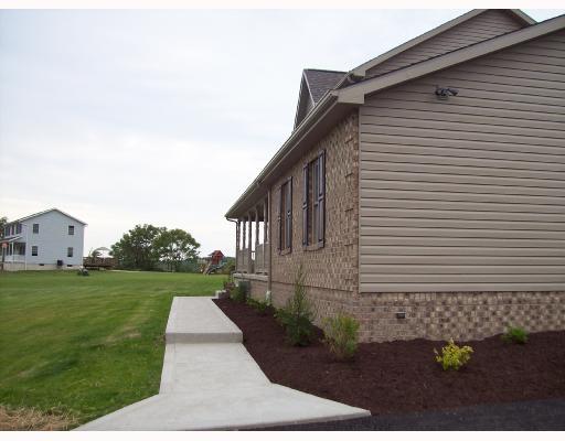 240 Zitney Road Vanderbilt, PA 15486 - Photo 3 of 8 Exterior Front. Professional landscaped lot