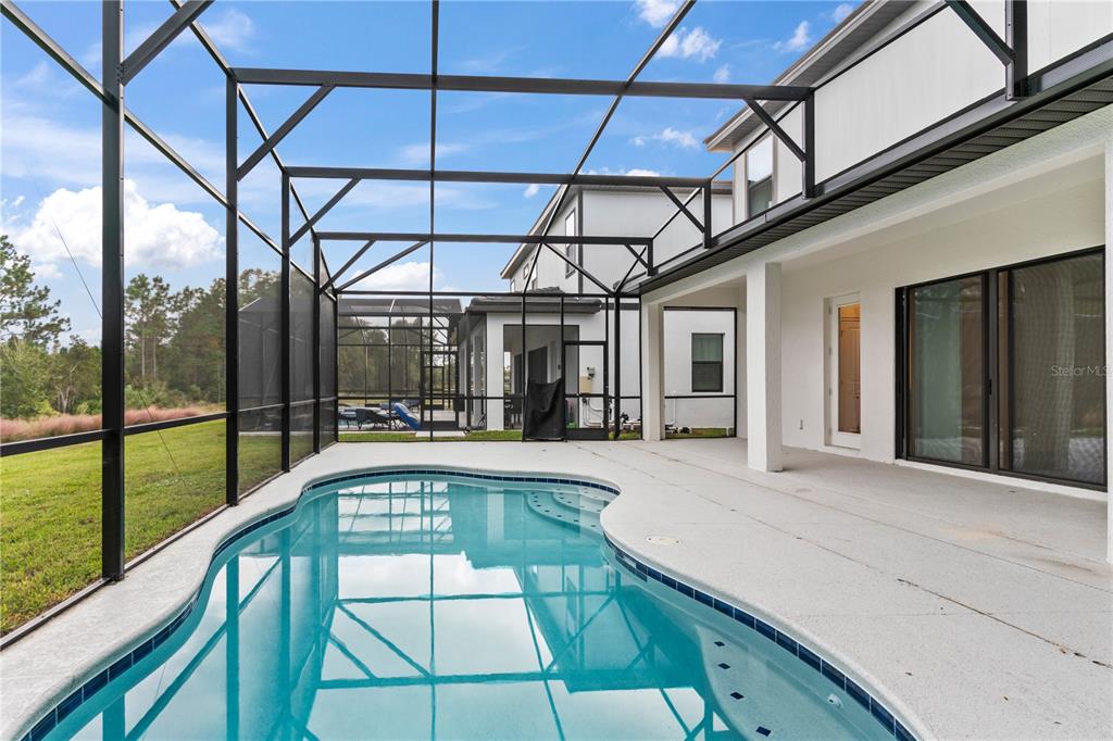 1205 Butterfly Orchid Road Davenport, FL 33837 - Photo 46 of 69 a view of a balcony