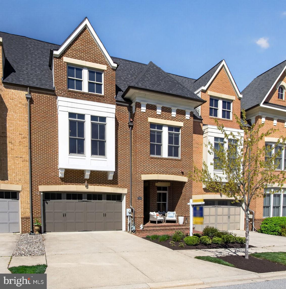 Charming brick townhome with curb appeal.
