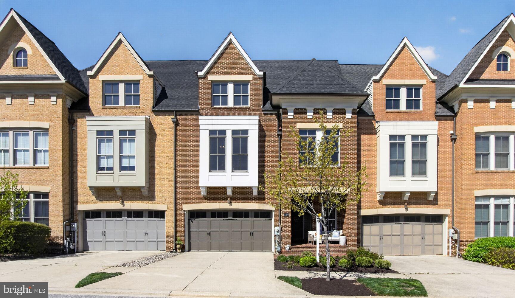 7769 Tilghman Street Fulton, MD 20759 - Photo 2 of 71 Charming townhomes in a sunny row.