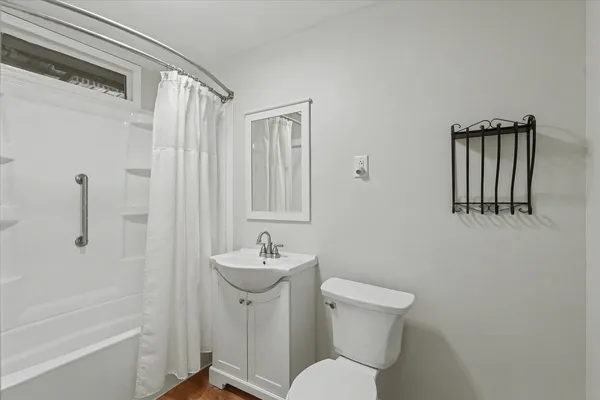 a view of a room with wooden walls