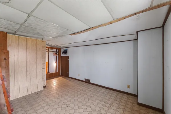 a view of a room with stairs