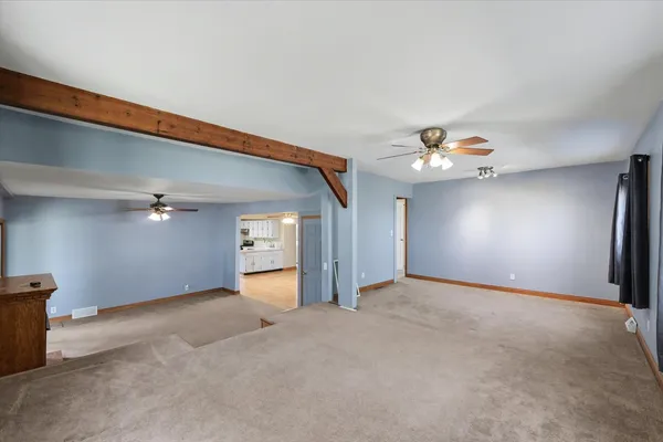 a view of a livingroom with a staircase