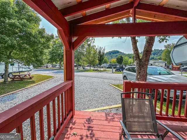 a view of a swimming pool with a patio