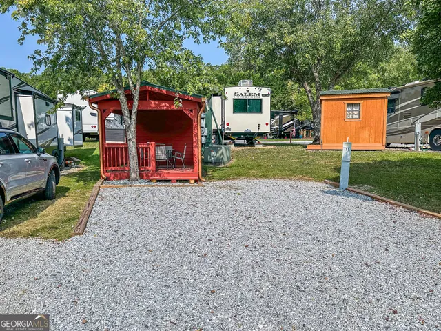 a view of a house with a back yard