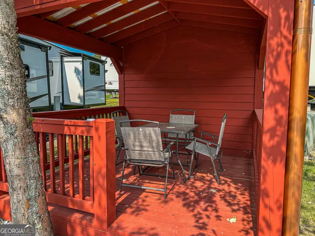 a view of chair and table in the patio