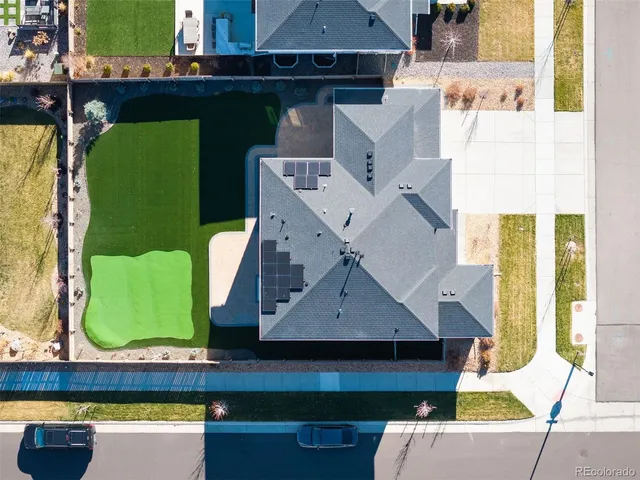 a view of swimming pool with deck and yard