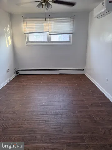 a view of a refrigerator in a room