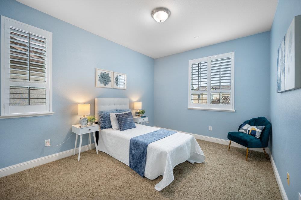 5813 Cajon Way Gilroy, CA 95020 - Photo 20 of 55 a bedroom with a bed and a window