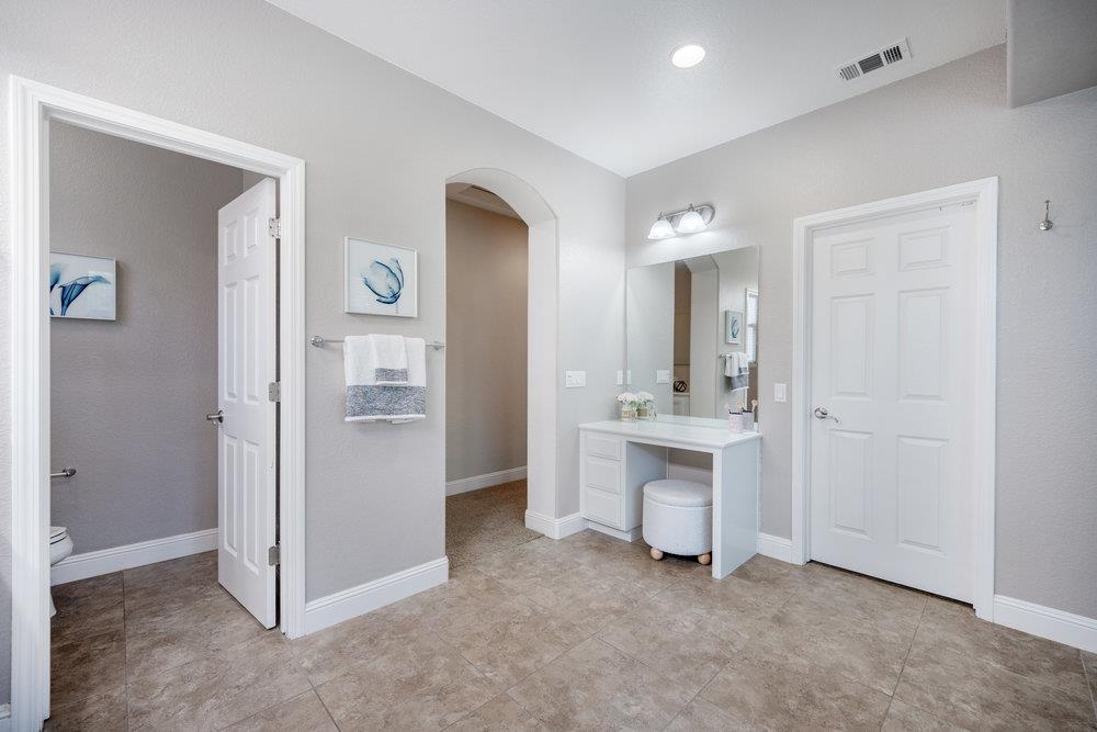 5813 Cajon Way Gilroy, CA 95020 - Photo 31 of 55 a view of a bathroom with sink mirror and window