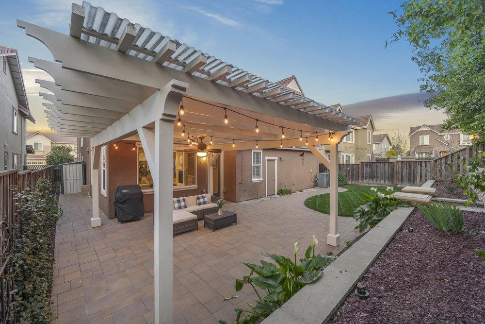 5813 Cajon Way Gilroy, CA 95020 - Photo 50 of 55 a view of a chairs and table in backyard