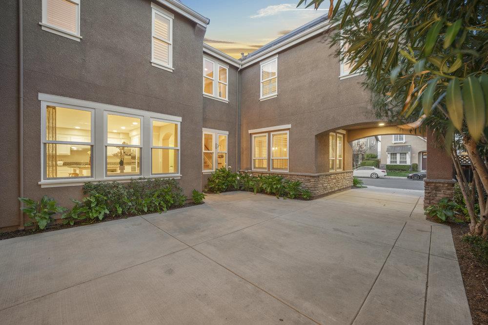 5813 Cajon Way Gilroy, CA 95020 - Photo 52 of 55 a front view of a brick house with a yard