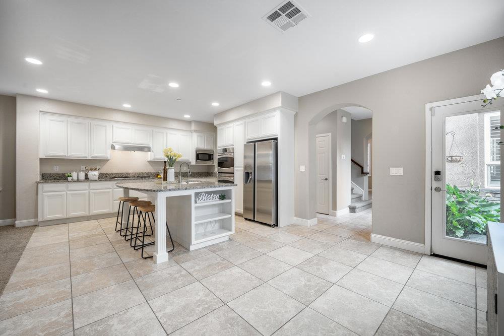 5813 Cajon Way Gilroy, CA 95020 - Photo 6 of 55 a kitchen with a refrigerator and a sink