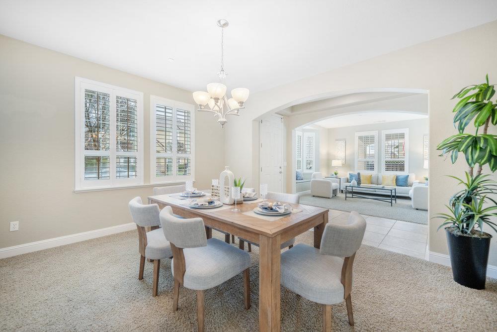 5813 Cajon Way Gilroy, CA 95020 - Photo 7 of 55 a view of a dining room with furniture window and outside view