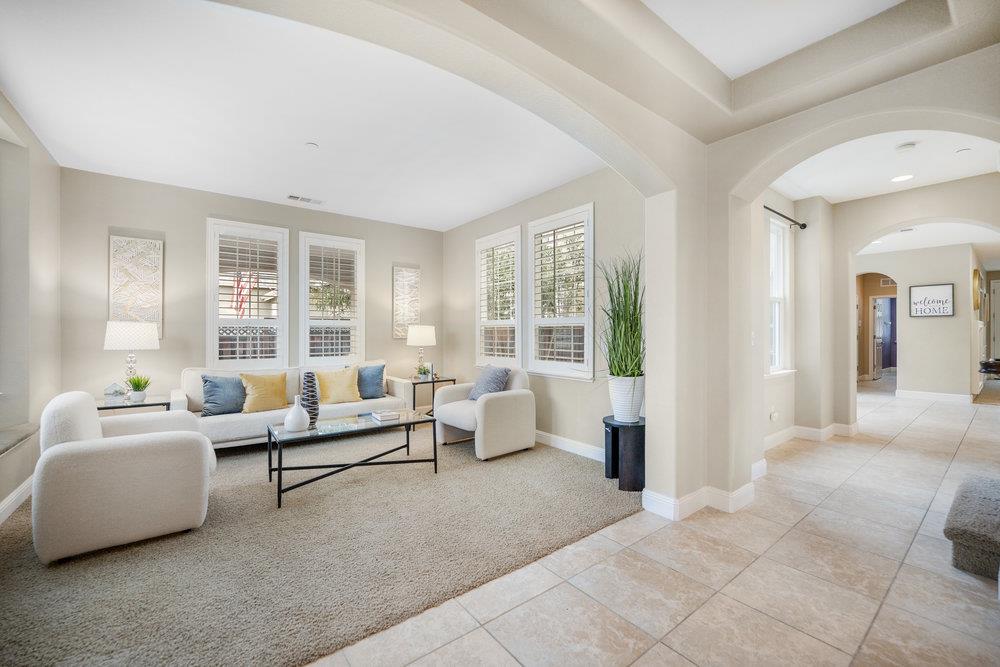 5813 Cajon Way Gilroy, CA 95020 - Photo 9 of 55 a living room with furniture and large windows