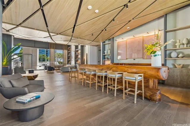 a outdoor space with lots of furniture and outdoor seating