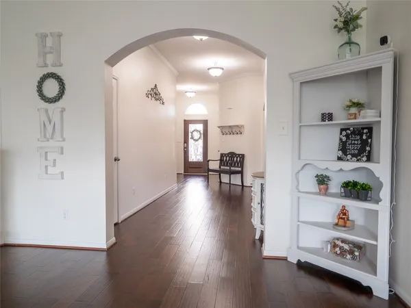 a view of livingroom with furniture and wooden floor