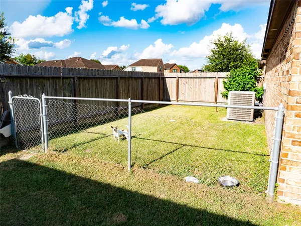 a garden view with a swimming pool