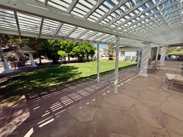 10561 Rancho Destino Road Las Vegas, NV 89183 - Photo 24 of 29 View of patio featuring a pergola