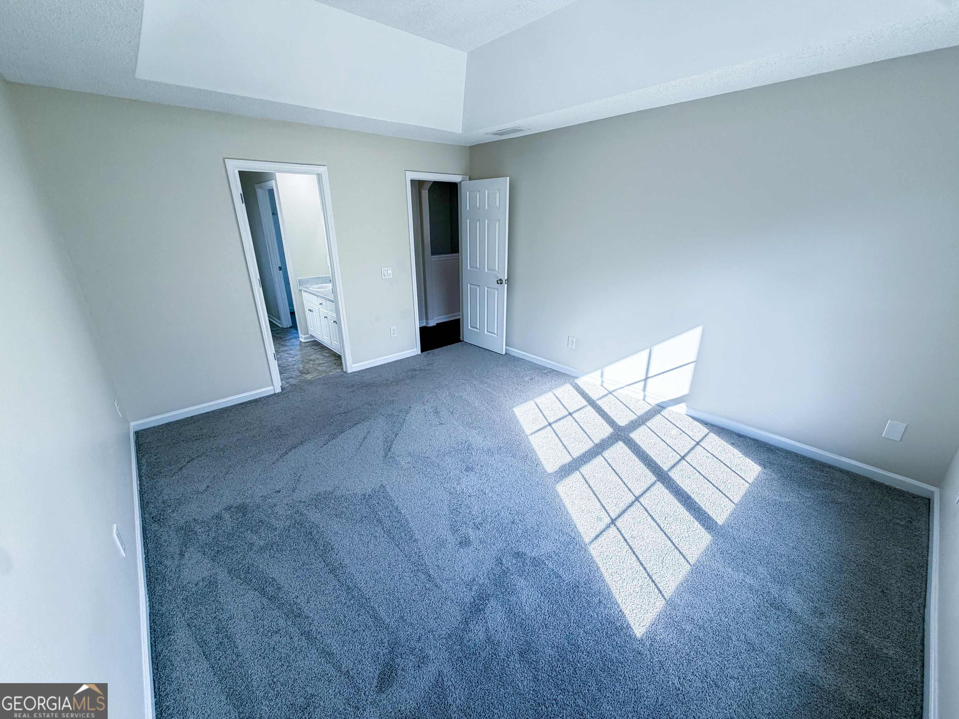1119 Hummingbird Way Winder, GA 30680 - Photo 19 of 38 a view of empty room with wooden floor