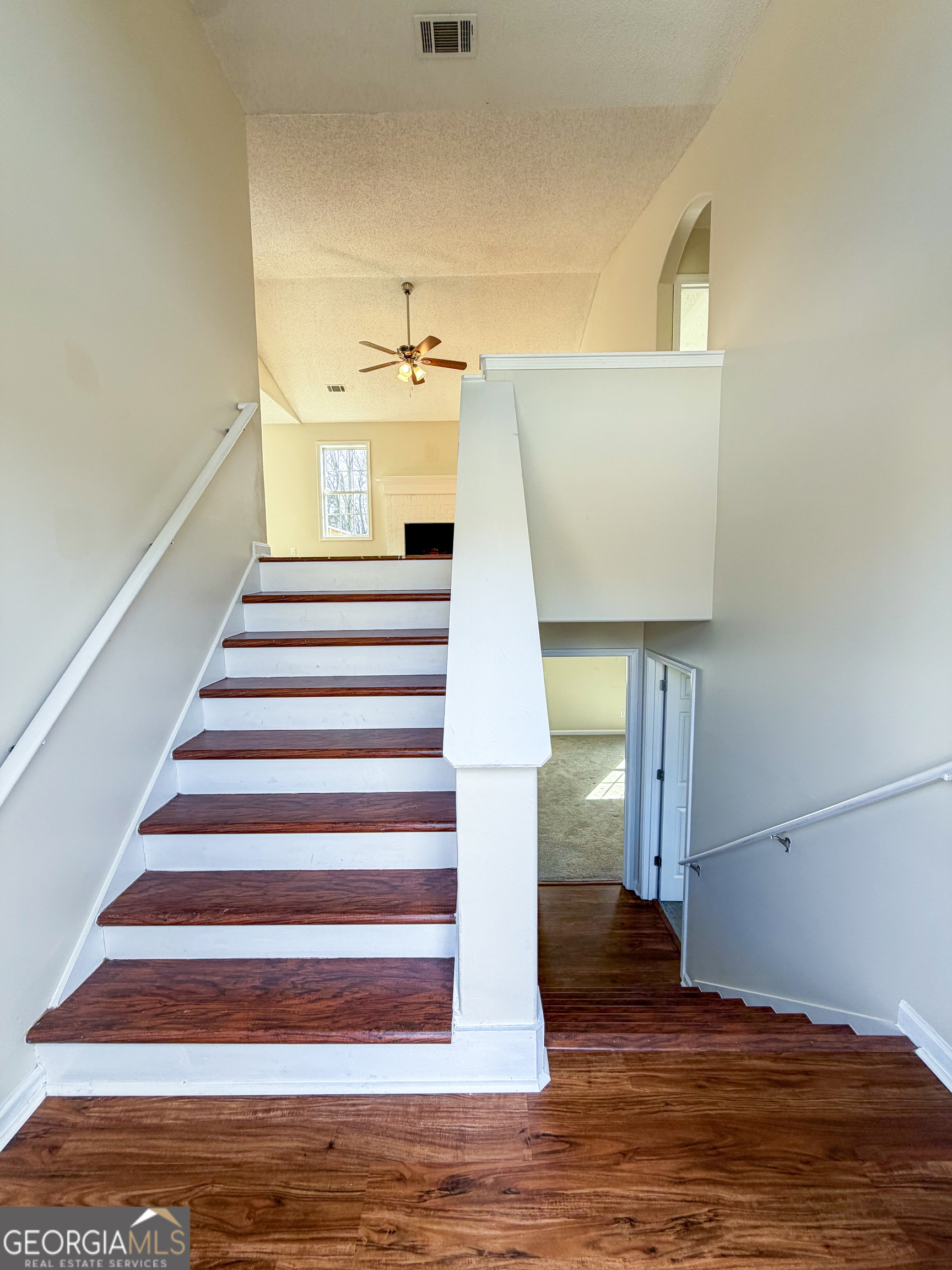 1119 Hummingbird Way Winder, GA 30680 - Photo 24 of 38 a view of entryway and hall with wooden floor