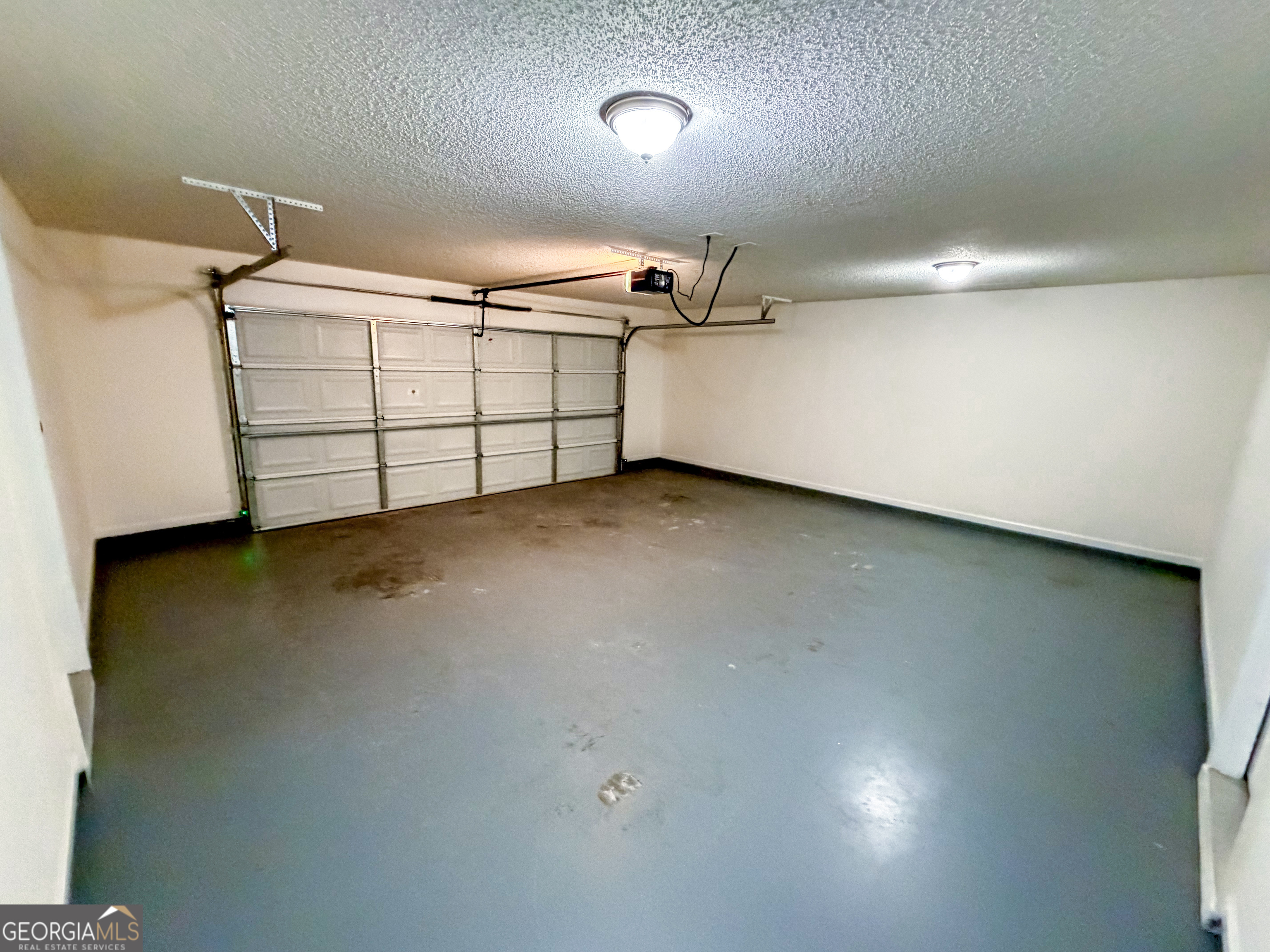 1119 Hummingbird Way Winder, GA 30680 - Photo 33 of 38 a view of a garage
