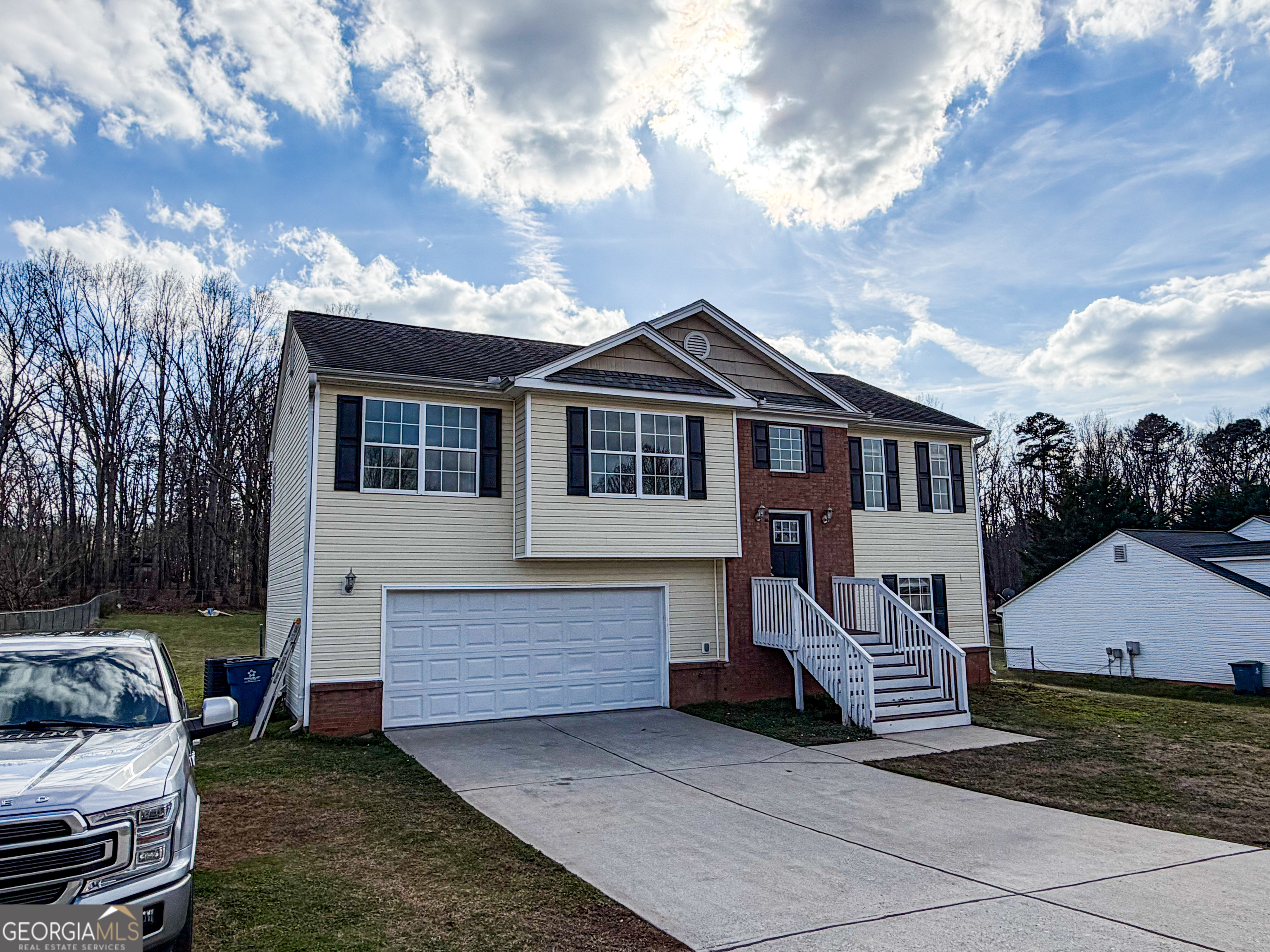 1119 Hummingbird Way Winder, GA 30680 - Photo 35 of 38 a view of a house with a yard and furniture