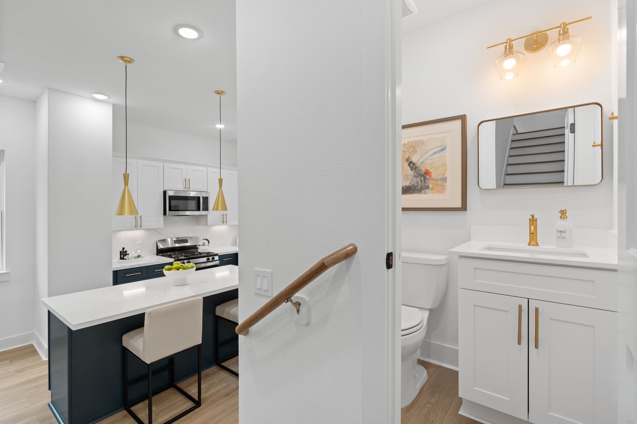 717 Janisch Road, Unit I Houston, TX 77018 - Photo 7 of 19 a kitchen with white cabinets and chairs