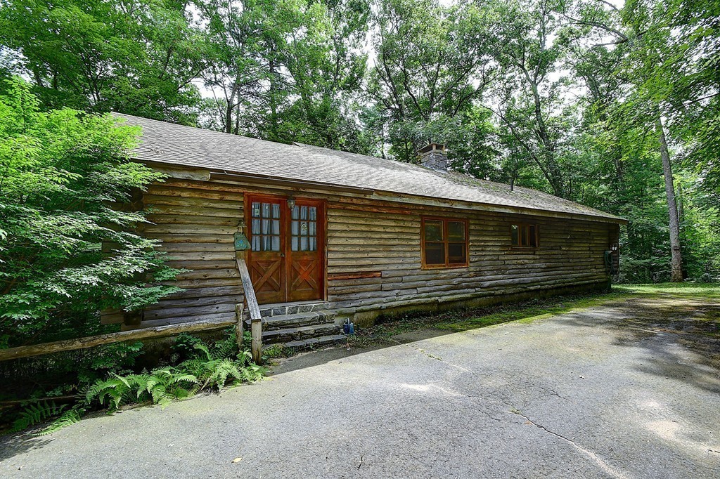 65 Allen Hill Road Holland, MA 01521 - Photo 3 of 29 a front view of a house with a yard