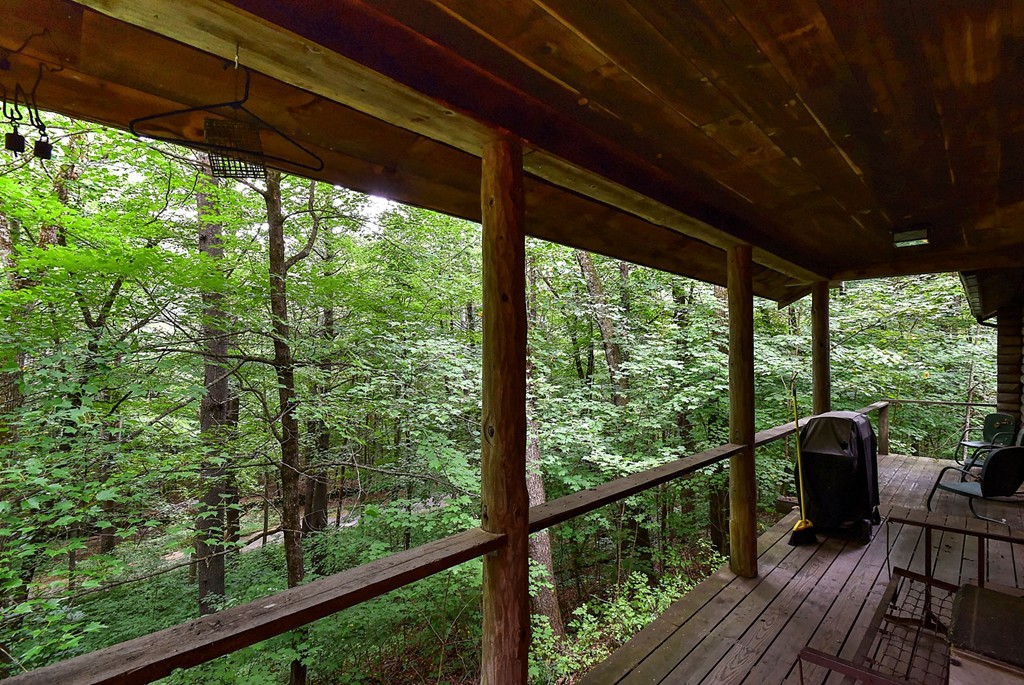 65 Allen Hill Road Holland, MA 01521 - Photo 8 of 29 a view of a room with wooden floor and outdoor seating