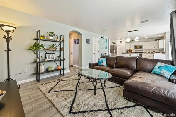 a view of a living room or kitchen and a couch