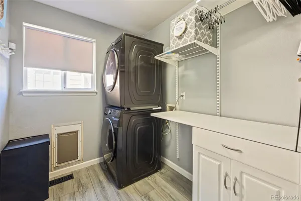 a bathroom with a sink a mirror and a shower