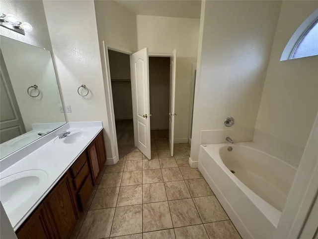 a bathroom with a bathtub