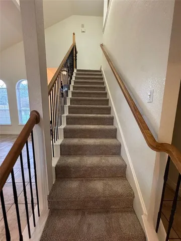 a view of entryway with a front door