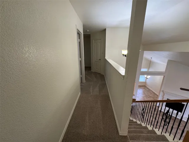 a view of empty room with windows