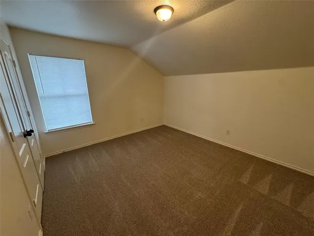 a view of a backyard with a garden