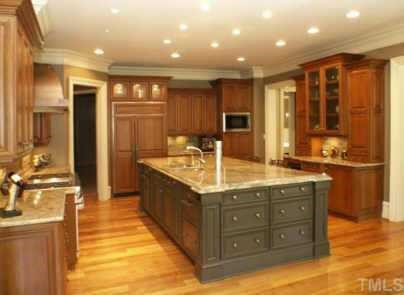 Professionally equipped kitchen with huge center island, two Fisher Paykel dishwashers, dual fuel Wolf stove with six burners and double ovens, SubZero 48' refrigerator and wine cooler Other