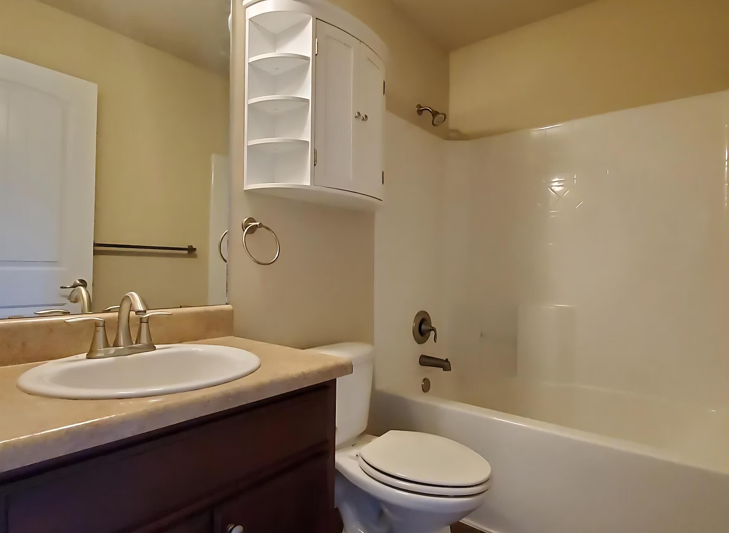110 Bronze Circle Crestview, FL 32539 - Photo 12 of 12 a bathroom with a sink a toilet and shower
