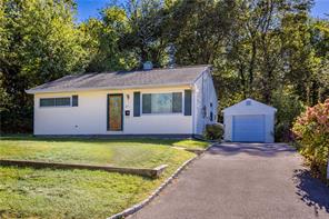 27 Seneca Street Peekskill, NY 10566 - Photo 1 of 1 a front view of a house with a yard