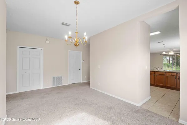 a view of a chandelier in a room