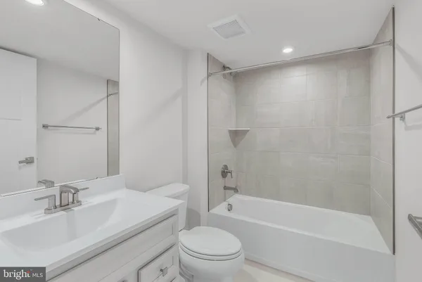 a view of a storage & utility room with washer and dryer
