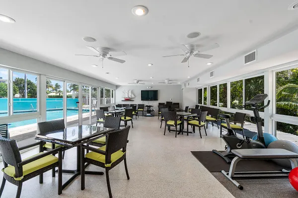 a view of a dining room with furniture window and outside view