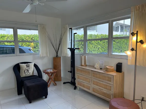 a room with furniture and a window
