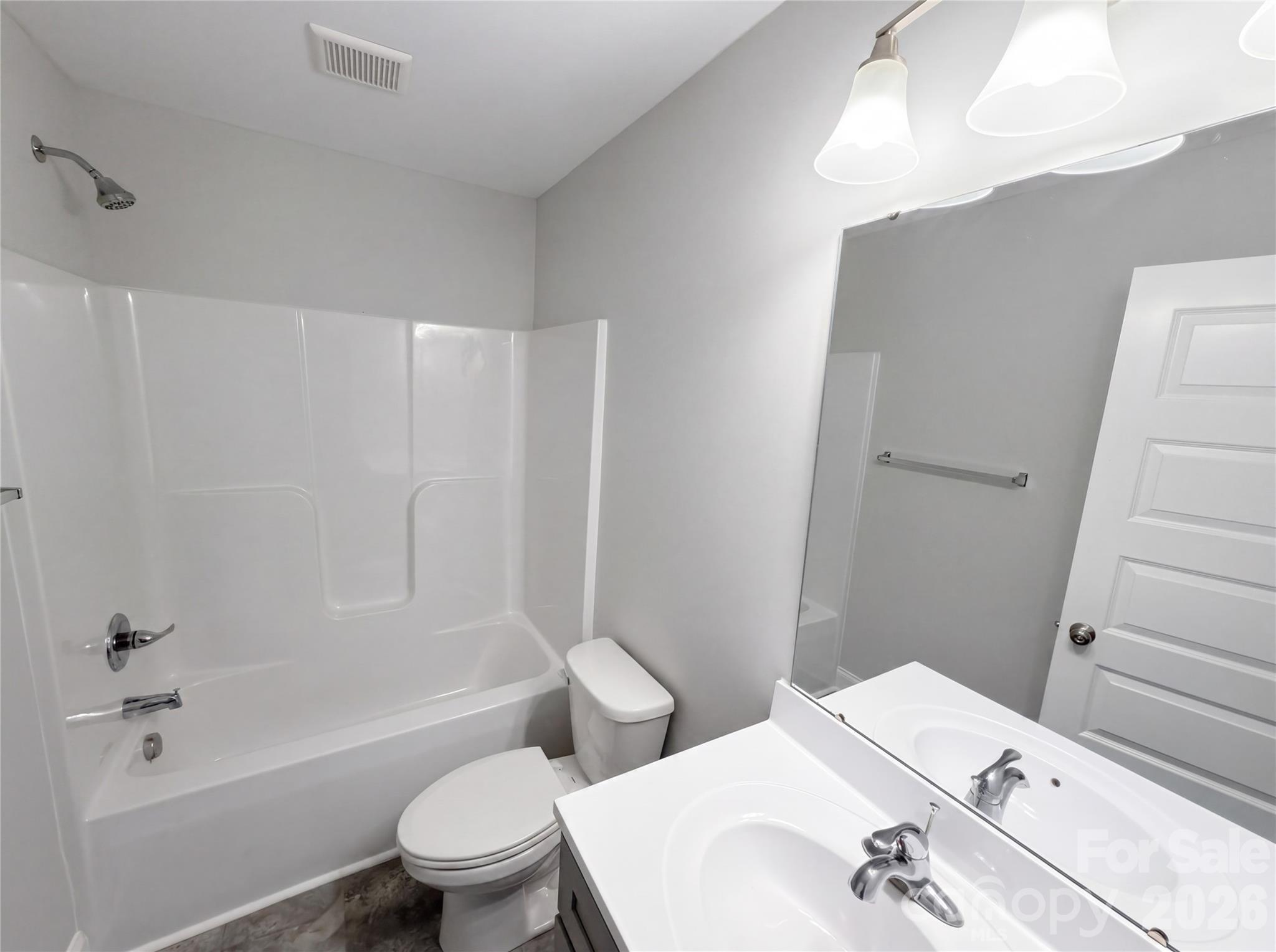 4918 Griffith Road Monroe, NC 28112 - Photo 12 of 17 a bathroom with a sink a toilet and shower