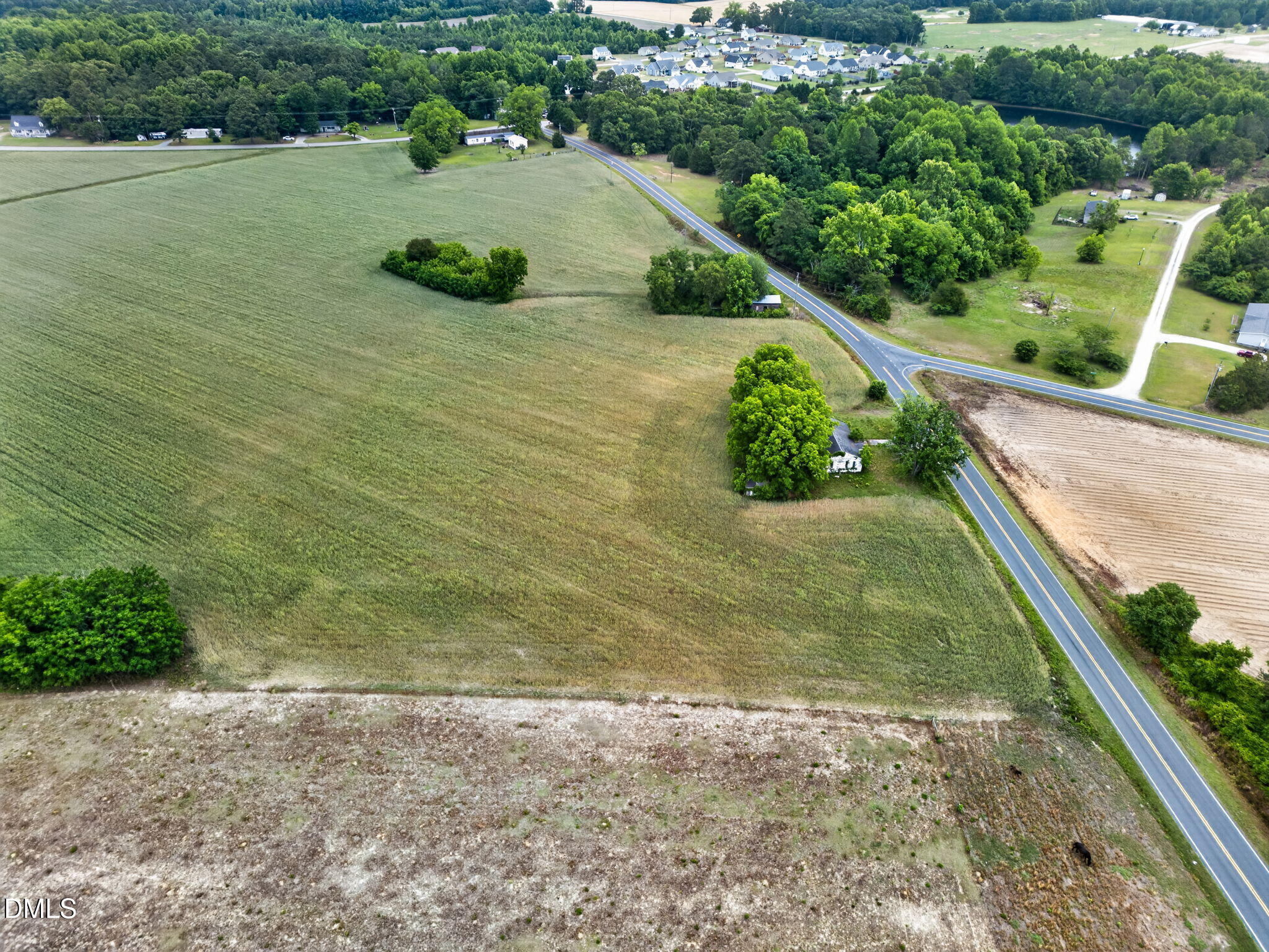 1651 Live Oak Road Angier, NC 27501 - Photo 14 of 22 a view of a yard with potted plants