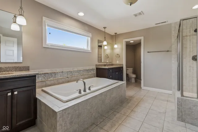 $920,000 | 12318 Whispering Breeze Drive, Fishers, IN 46037