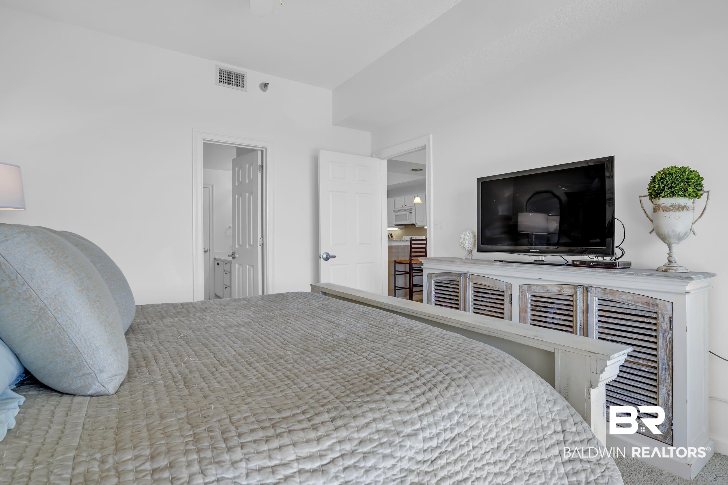 27282 Canal Road, Unit 104 Orange Beach, AL 36561 - Photo 33 of 79 Bedroom featuring ceiling fan